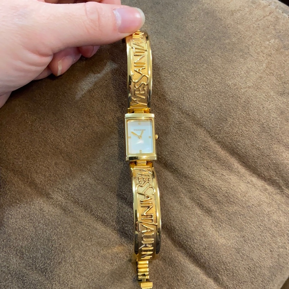 Yves Saint Laurent 40th anniversary bangle watch.